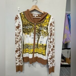 Super stylish and funky hooded zip up cardigan.